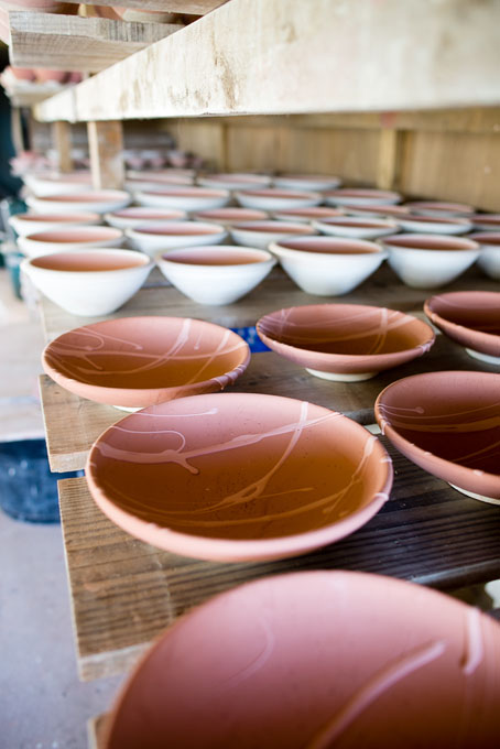 Svend Bayer loading his small kiln 2016